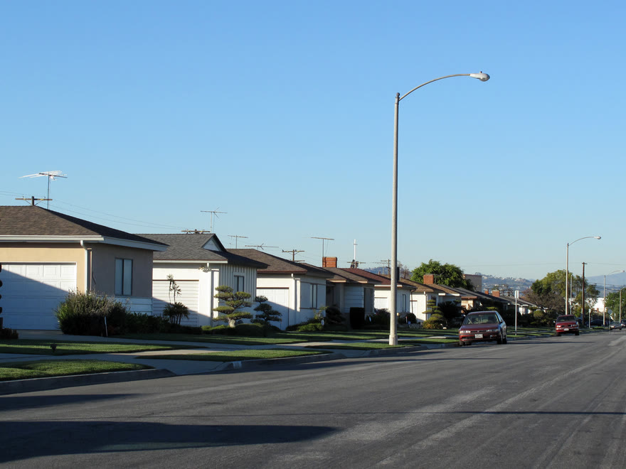 The 3800 block of South Norton Avenue in Los Angeles today: a quiet residential street of low houses.